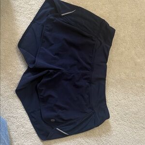 Women’s navy blue Athleta running shorts